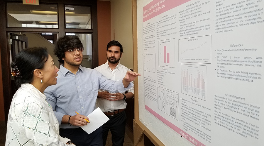 marketing major student looking over chaulk board