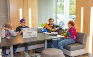 parents with son around reserved table