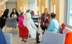 Jessica Roberts talking to family members