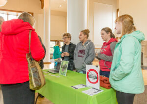 parents at thrift store table