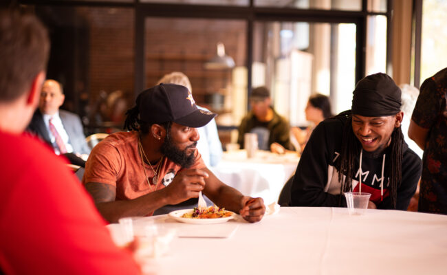 men sitting at table