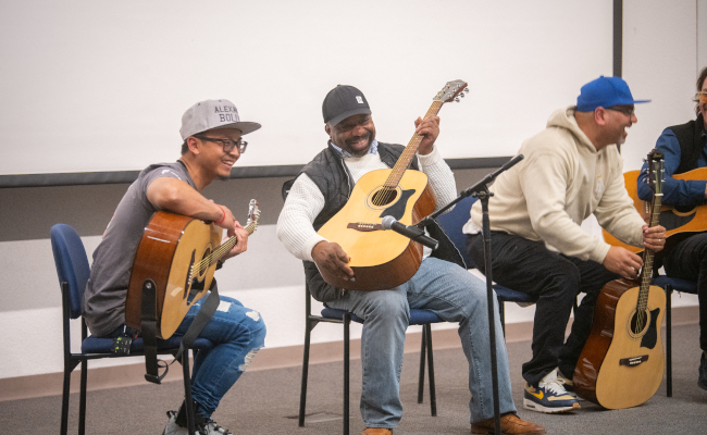 students playing guitar