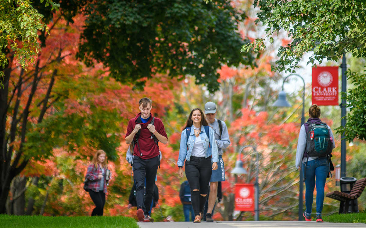 students walking across campus