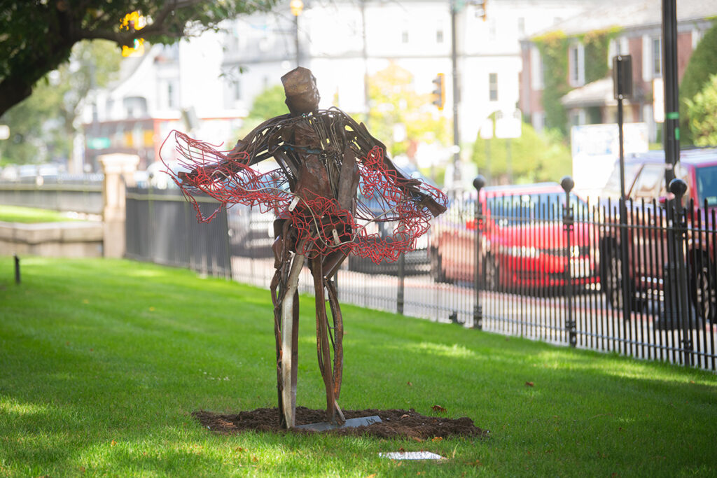 sculpture on front lawn of Clark University