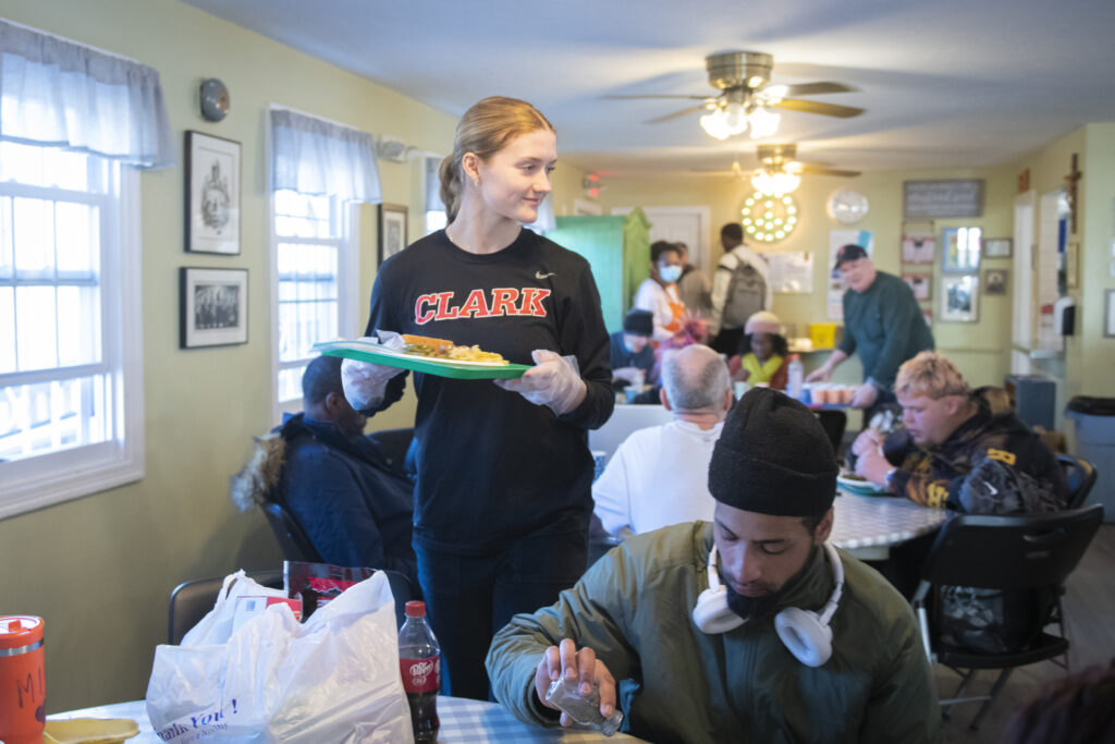 student serving community food